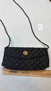lot 177 image: LeSportsac Black Drawstring Bag with Gold Flower Accent