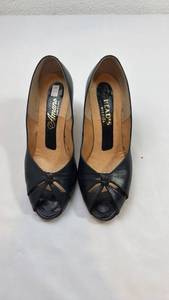 lot 53 image: Black Leather Peep Toe Pumps