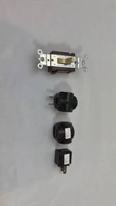 lot 67 image: Leviton 15A 120V Toggle Switch with Adapters