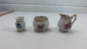 lot 92 image: Miniature Decorative Porcelain Creamer Set