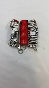 lot 93 image: Blingsting Pepper Spray Keychain Set - Zebra & Red Crystal