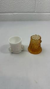 lot 94 image: Milk Glass and Amber Glass Toothpick Holders