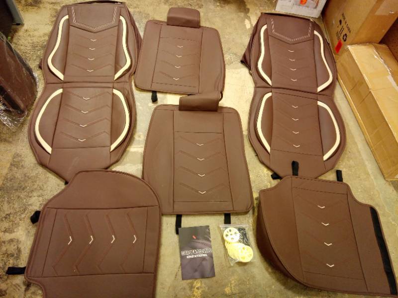 lot 2014 image: Brown Leather Car Seat Covers with Beige Accents - Complete Set. Not sure on vehicle  - Retail $89