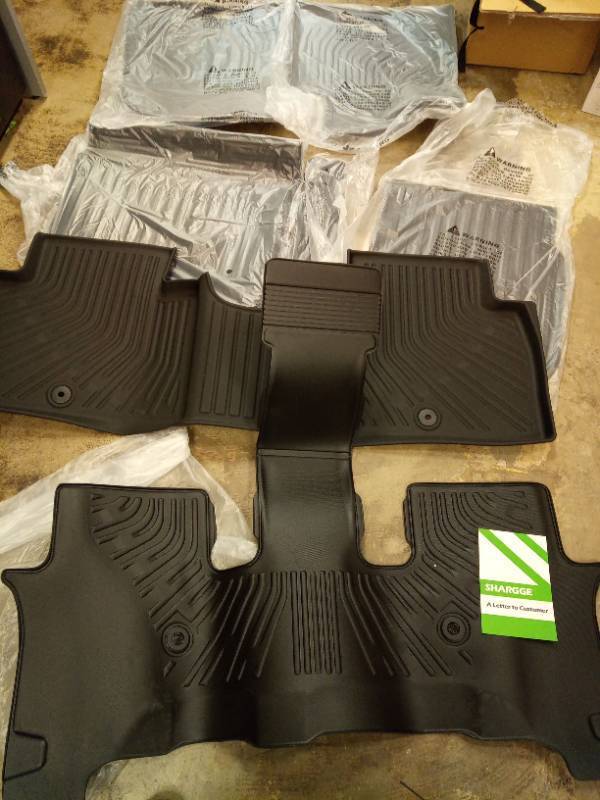 lot 2015 image: All-Weather Floor Mats Complete Set not sure on vehicle  - Retail $189