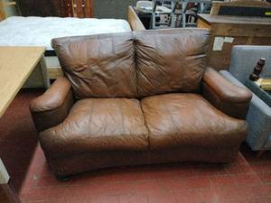 lot 59007 image: Brown Leather 2 Seater Sofa - Missing Back Leg - Retail $0