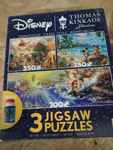 lot 20384 image: Set of Disney Theme Puzzles - Retail $0