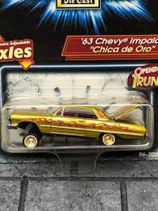 lot 20339 image: Revell Lowriders 63 Chevy Impala Chica de Oro - Retail $0