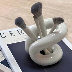 lot 4363 image: Minimalist Design White Ceramic Makeup Brushes Holder Stand Rack Organizer, Cosmetic Pen Toothbrushes Holder Dressing Table Decor