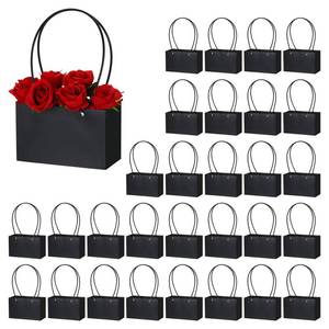 lot 12364 image: PATIKIL Paper Flower Gift Bags, 30 Pcs Paper Bouquet Flower Gift Bag with Handle Rectangular Tote Bag for Florist Wedding Party Birthdays, Black (Used) (Missing Bags)