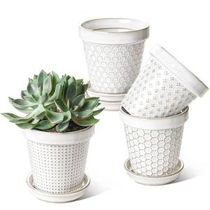 lot 17202 image: LE TAUCI Ceramic Plant Pots, 4.9 Inch Flower Pots with Drainage Hole & Saucer, Embossed Planter Pots for Indoor Plant Succulent, Orchid, Cactus, Home Decor - Set of 4, Arctic White