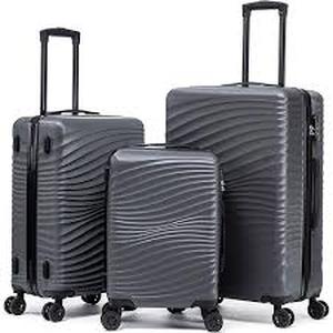 lot 5895 image: Hard Shell Spinner Luggage Set with Wave Design