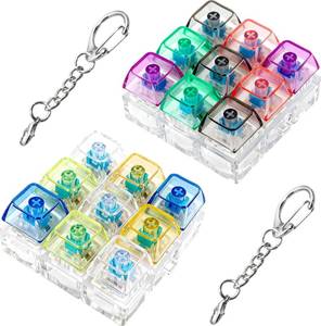 lot 16367 image: 2 Pack 9 in 1 Keyboard Fidget Toy, Keyboard Fidget Keychain Keyboard Decompression Button Finger Clicker Toys Stress Relief Fidget Gifts (Mix Transparent)