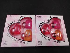lot 18428 image: Fickle Heart Magic Sweet Lip Oil Set - Love Me, Love Me Not Collection 2pk