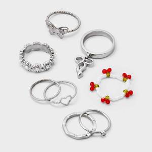 lot 157 image: Butterfly and Bow Ring Set 7pc - Wild Fable�� Silver Iron, Acrylic, Zinc Alloy, Sizes 6-8 - Retail $10