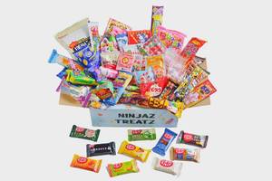 lot 1398 image: 50 Japanese Snacks and Sweets Box 40 Japanese Candy and 10 Japanese chocolate bar assortment