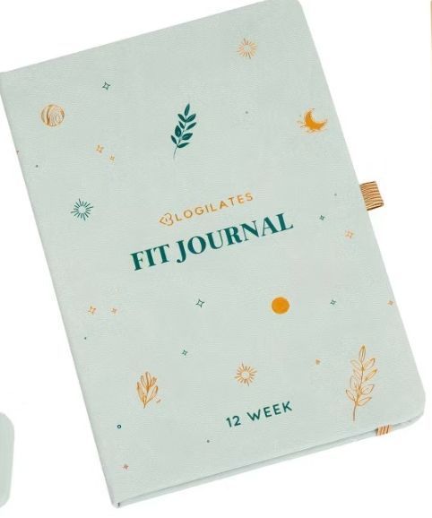 lot 4945 image: Blogilates 12 Week Fit Journal Hard Cover, Elastic Closure, Preprinted Pages - Retail $30