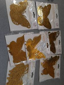 lot 18482 image: 7 Pack 3D Adhesive Gold Butterfly Decorations  - Retail $0