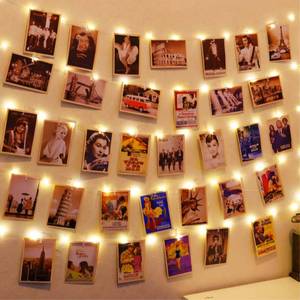 lot 18502 image: HXWEIYE 120LED Warm White 40Ft Fairy String Light with 52 Clear Clips & 12 Hooks, USB Powered, Waterproof, 8 Modes & Timer, Perfect for IndoorOutdoor, Bedroom, Party, Wedding Decor - Retail $10