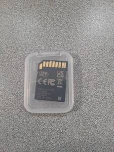 lot 18546 image: GPS Navigation SD Card - Compatible with Envision & XT6 & Silverado 1500 LTD2500 HD & Sierra HD ONLY, Requires Factory SD Slot, PN 85549837��for Select 2021-2023 GM Models