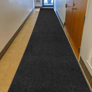 lot 2895 image: $127 MaxMat  Oversized Rubber Door Mat 3 x 16 ft Black MXM-RIB0316BK