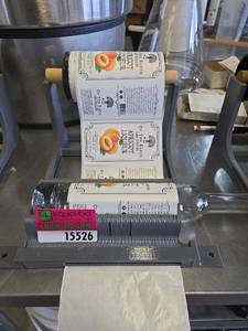 lot 15526 image: Commercial Label Dispenser Stand
