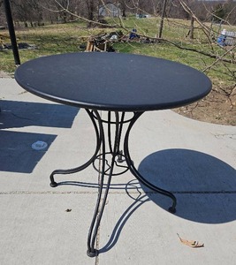 lot 20522 image: Round Black Metal Bistro Table