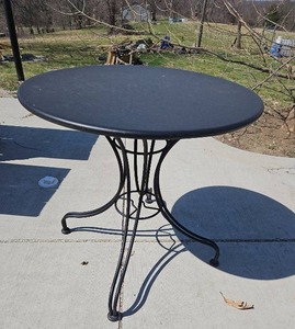 lot 20524 image: Round Black Metal Bistro Table