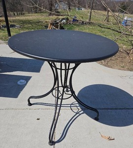 lot 20525 image: Round Black Metal Bistro Table