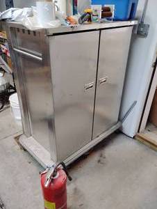 lot 18568 image: Stainless Steel Rolling Cabinet W Content