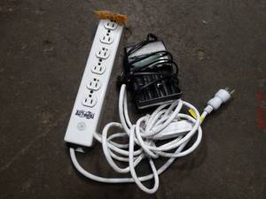 lot 22953 image: Lot of Power Supplies. Extension Cord. Power Strip & Battery Charger.