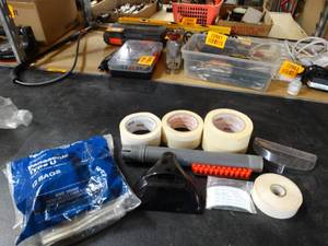 lot 22971 image: Lot of Misc House Supplies - Tape & Vacuum Supplies  Attachments.