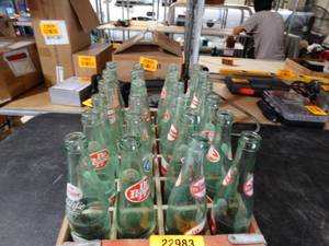 lot 22983 image: Vintage Coca-Cola Glass Bottle Holder with Dr.Pepper Bottles, A&W, & Crown Royal Bottle