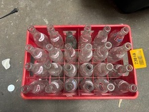 lot 23018 image: Class Bottle Crate Full of Misc. Pepsi Bottles