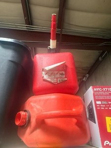 lot 23047 image: 2 Red Gas Cans