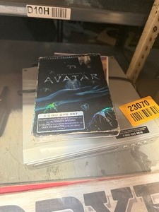 lot 23070 image: DvD Player With 2 Movies.