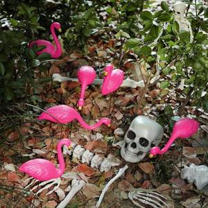lot 2308 image: 15 Pcs Halloween Skeletons Flamingo Yard Decorations Pink Flamingo Eating Skeleton Outdoor Decor 17 Includes 6 Yard Lawn Ornament 9 Plastic Skeleton Head Bones for Halloween Garden