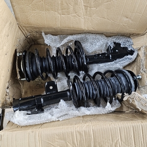 lot 2348 image: MOSTPLUS Front Pair Complete Coil Spring Shock Absorbers M141321322Q