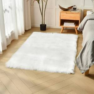 lot 78 image: duduta White Faux Sheepskin Fur Rug 3x5 ft, Fluffy Shag Bedroom Dorm Nursery Playroom Carpet Rug Non Slip Washable - Retail $30