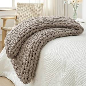 lot 135 image: Bigacogo Chunky Knit Throw Blanket for Couch, 40x60 inches, 100% Hand Knitted with Thick Jumbo Chenille Yarn, Cozy Soft Large Rope Knot Cable Crochet Blankets for Sofa Bed Living Room, Taupe - Retail $42