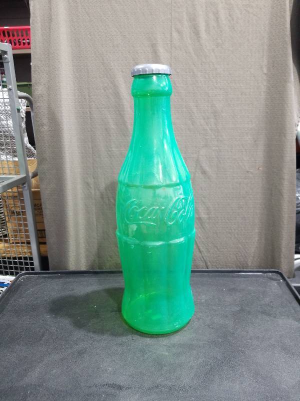 lot 4346 image: Green Coca-Cola Glass Bank Bottle