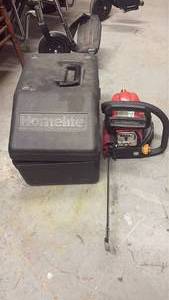 lot 58972 image: Homelite Gas Chainsaw with Case and Accessories - Retail $125