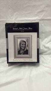 lot 59026 image: Silver Stamped Metal Frame Photo Album - Retail $15