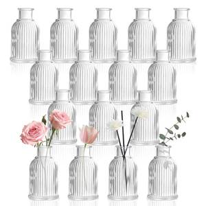 lot 5917 image: DomeStar 16PCS Glass Bud Vases Set for Bouquet, Mini Clear Vintage Clear Cylinder Vases for Flowers, Small Flower Vase Suitable for Birthday Party, Anniversary, Wedding, Baby Shower Party Home Decor