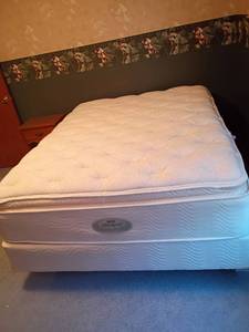 lot 204 image: Queen Sized Beautyrest Mattress and Box Springs with Frame.   Located Upstairs