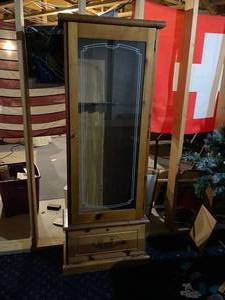 lot 301 image: Wood and glass gun cabinet 67 x 25 x 13 in IN BASEMENT