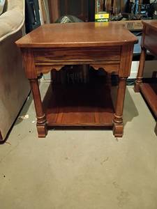 lot 312 image: Oak End Table with Lower Shelf.   Top portion moves up and out.   22 x 22 x 26.  Located in Basement