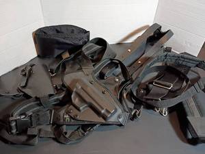 lot 352 image: Shoulder Holsters and Extra Straps