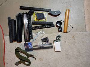 lot 405 image: Uplula Pistol Magazine Reloader, Scope Ring Mounts and More
