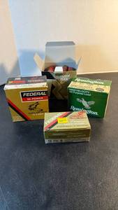 lot 1053 image: Assorted 12 ga ammunition 4 boxes (3 are full 1 nearly full)