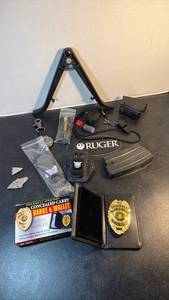 lot 1072 image: Clip on bipod, concealed carry badge and wallet and more